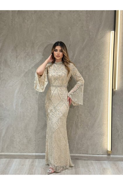 فستان سهرة ملكي تطريز لؤلؤ وكريستال شامبين ملكي
