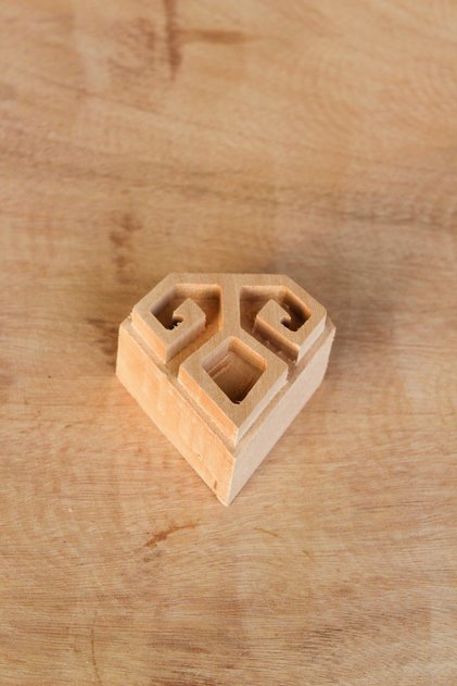 Traditional Pattern Wooden Printing Mold on Hand and Waist