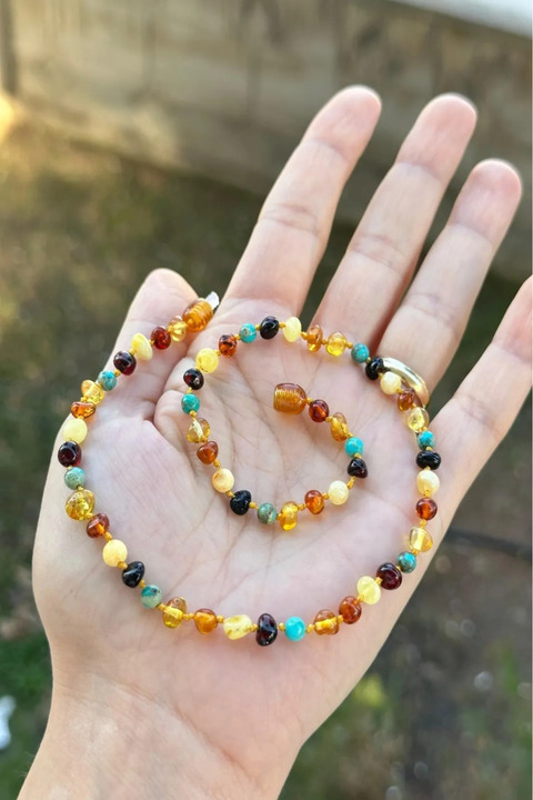 KEHRİBAREVİ KARAMAN Damla Kehribar Bebek Kolye Firuzeli Model