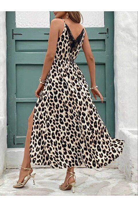 Kokosh moda Kadın Yuvarlak Yaka Sırt Detaylı Yırtmaçlı Uzun Desenli Yazlık Süprem Elbise