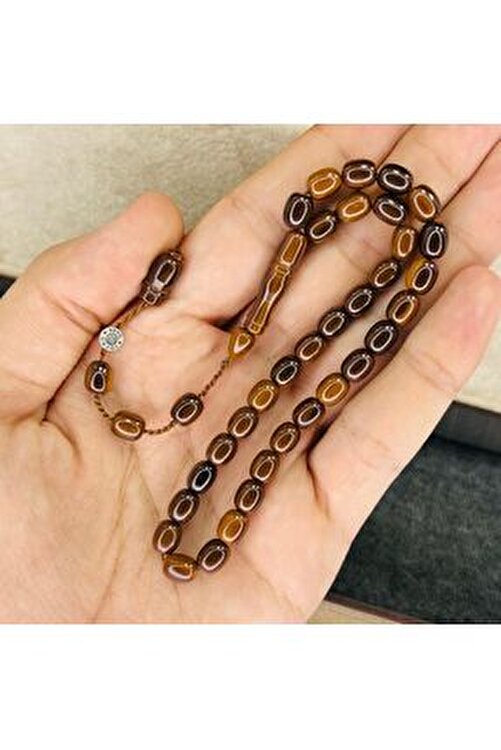 tespih ile italyan boynuzu dövme