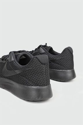 Nike tanjun 001 online