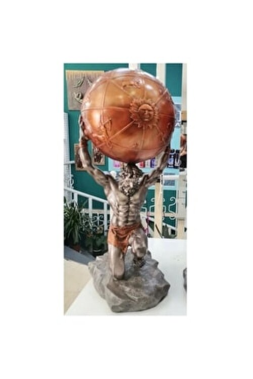 dünya çizimini tutan atlas