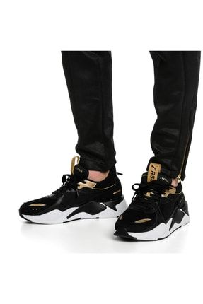 Puma rs x hotsell trophy black gold