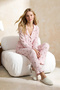 Pembe Çiçekli Fırfır ve Baby Overloklu Bürümcük Dokulu Örme Pijama Takımı THMSS26PT00017
