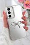 Galaxy S24 Fe Case Mirrored Silver 3D Bow Pattern Shock Absorbing Silicone Cover