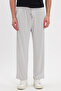 Men's stone baggy fit relaxed cut modal fabric soft texture drawstring waist side pockets sweatpants