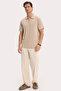 Men's slim fit, extra soft modal short sleeve polo shirt with half-zip detail in beige. - 2
