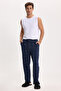 Men's standard fit regular cut cotton checkered navy blue pajama bottoms with drawstring waist and pockets.