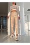 Cremefarbene Lacklederhose