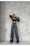 Shiny fabric trousers with elastic waist
