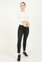 Black Super Skinny Jeans that do not shed color and are loose-fitting.