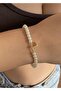 Gold bracelet with letter L and pearls