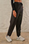 Women's Black Stretchy Fabric Carrot Leg Loose Knitted Trousers Shalwar - 4