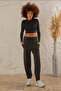 Women's Black Stretchy Fabric Carrot Leg Loose Knitted Trousers Shalwar