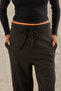 Women's Black Stretchy Fabric Carrot Leg Loose Knitted Trousers Shalwar - 7