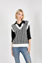 SCRATCHING SWEATER