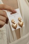 Heart and star patterned gold women's earrings
