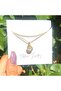 Small Opalite Synthetic Stone Wrapped Around Pendant Gold Color