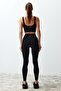 Siyah Fırçalı Toparlayıcı Mat ve Soft Kumaş Tam Boy Örme Spor Tayt THMSS24TY00025 - 6