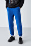 مقاس عادي للرجال من الداخل، نسيج ناعم، خصر مطاطي، بنطال رياضي أزرق ساكس