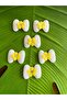 4x3 cm, 6-piece embossed bow/emblem applique sewing accessory, yellow.