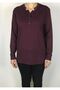 Lycra-textured Viscose sports blouse with rhinestone and button detail on the collar.