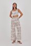 Beige Patterned Cropped top and pants set for summer. - 4