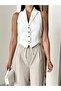 Ecru Vest with Back Tie - Cut-Out Detail
