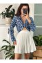 Pleated White Mini Skirt - With Shorts Inside