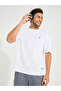 Soft Texture Badge Detail Oversized Athleisure T-Shirt