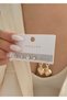 Gold mother-of-pearl heart-shaped single- embellished 3-piece earring set - 3