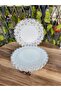 Lace pattern silver serving plate.
