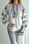 Tasseled embroidered cotton blouse