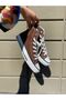 حذاء رياضي نسائي من الكتان البني موديل Convers - 4