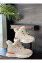- White Women's Boots with Quilted Detail and Fur Inside
