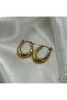 Gold Oval Serrated Steel Hoop Earrings