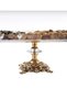 Metal-legged serving tray with gold details. - 2
