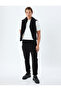 Sweatpants with Lace-Up Waist, Elastic Cuffs, Zipper Pockets, and Cotton Details. - 2
