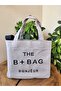 حقيبة كتف قماشية بحزام طويل باللون الرمادي من The B+Bag