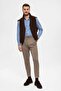 High-waisted men's trousers with buckle detail