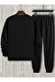 طقم بدلة رياضية سوداء اللون من Eagle Sweatshirt Alt Top برقبة دائرية كبيرة الحجم - 2