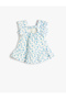 Dress with Floral Appliqué, Ruffles, and a Window Detail on the Back. - 2