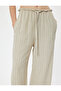Oversize Trousers with Lace-Up Waist, Ruffle Detail and Pockets - 5