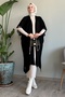 Black Knitwear Poncho with Tassel Detail on the Sleeves - 5