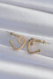 Ramia-Premium |   Brass Gold Color Zircon Stone Curved Half Heart Earrings Tj-Bkp9279 |   Tg.Ty - 2