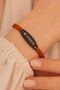 Spotify Women's Steel Bracelet Orange Black Ellipse Model