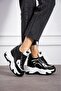 Layla Lace-Up High-Top Sneakers