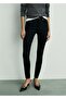 Wax Mid-Rise Skinny Jeans