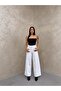بنطلون جينز بالازو باللون الأبيض - 7